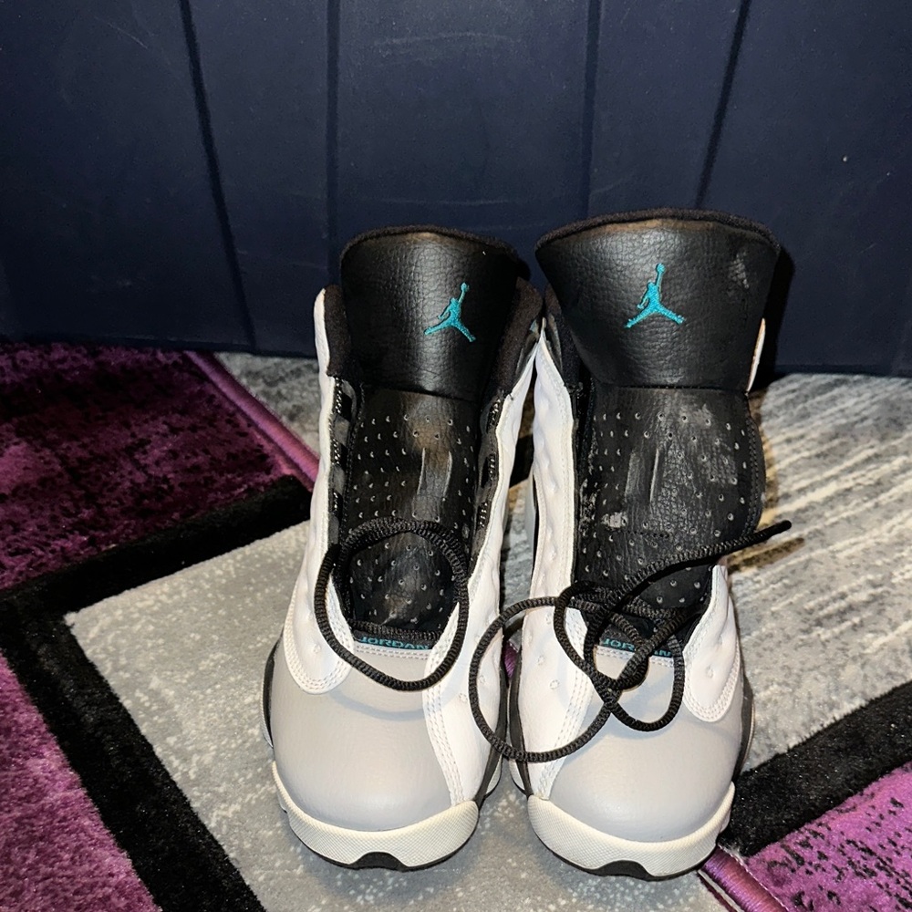 Jordan Retro 5 Sneakers in White, Black & Teal Accent
